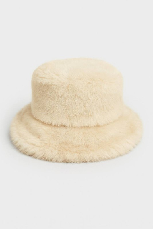 Beige bucket hat on a light gray background