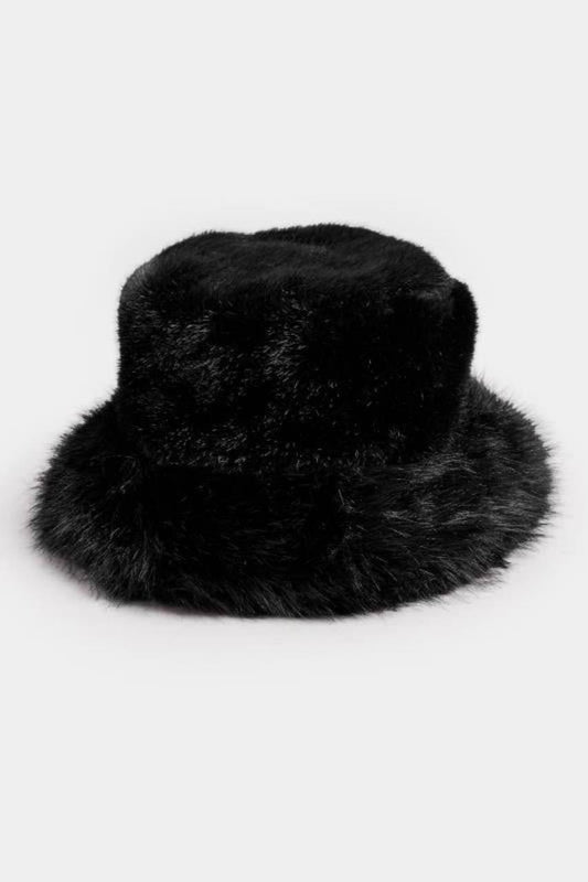 Black fur hat on a white background