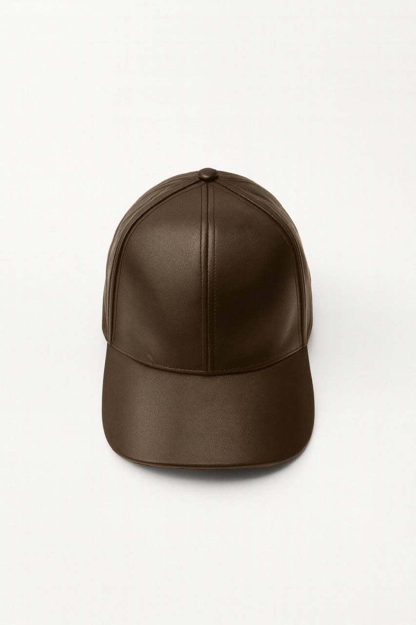 Brown leather cap on a white background